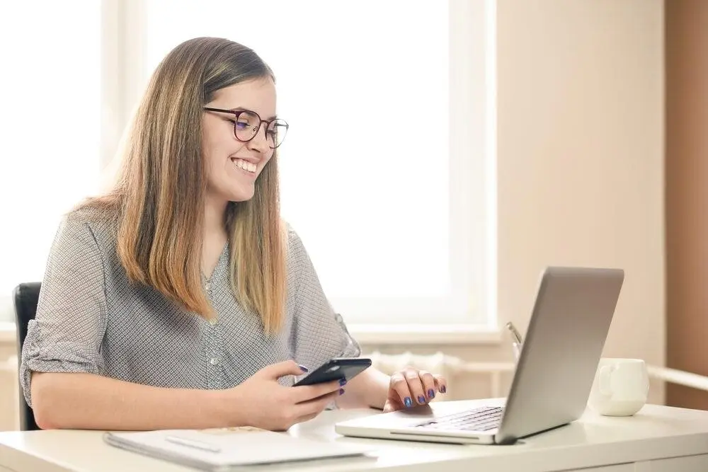 woman using laptop computer